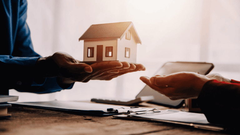 A landlord handing over a miniature house model to a tenant, symbolizing property transfer or agreement.