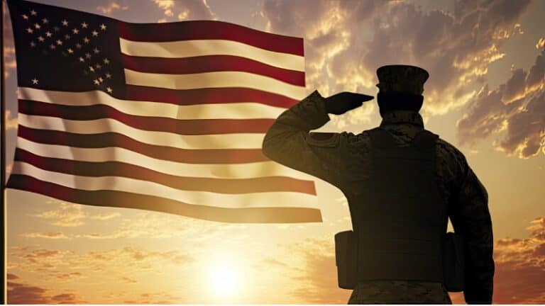 Soldier saluting, U.S. flag, sunset, military uniform, patriotic sky.