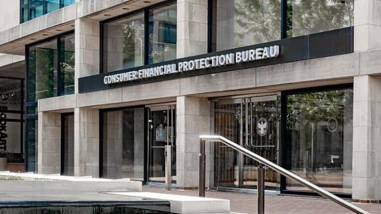 Exterior view of Consumer Financial Protection Bureau building entrance.