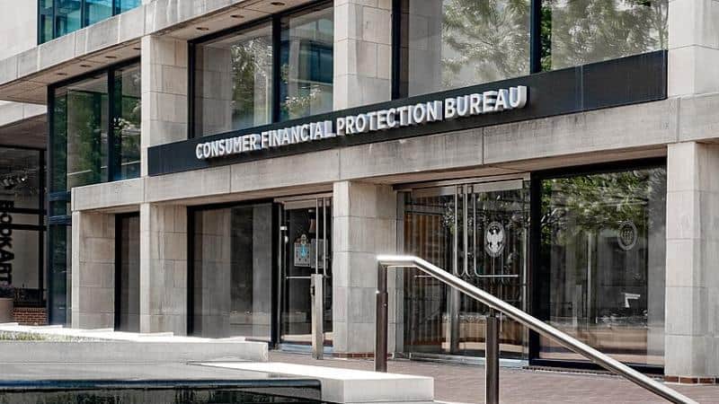 Exterior view of Consumer Financial Protection Bureau building entrance.