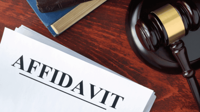 A legal document labeled “Affidavit” placed beside a judge’s gavel, symbolizing sworn testimony or official verification used in court cases.